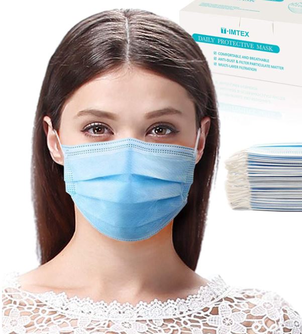 Woman wearing disposable 3 ply pleated protective face mask close-up
