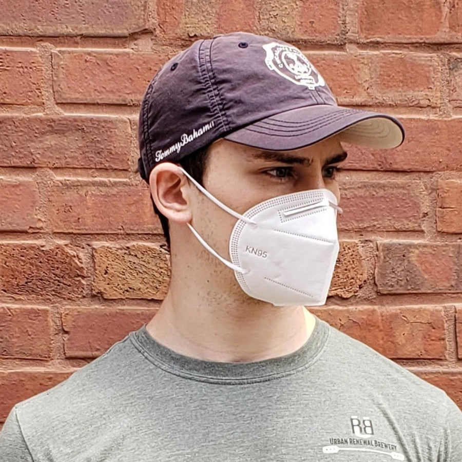 Man wearing KN95 face mask outdoors protective breathable mask 10 pcs pack