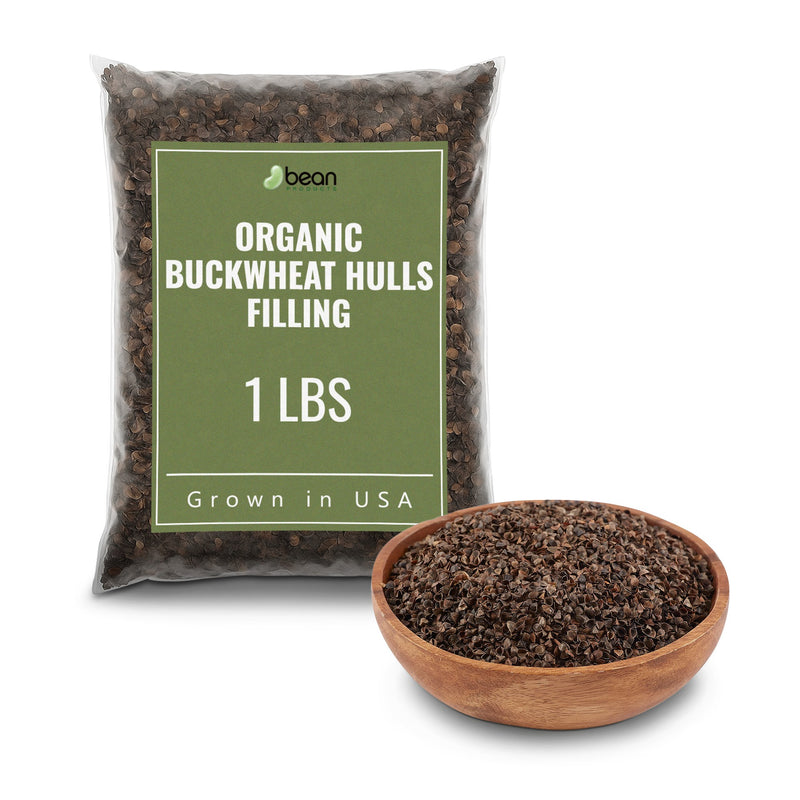 1 pound Bag of organic buckwheat hulls filling with a bowl of buckwheat hulls on a white background