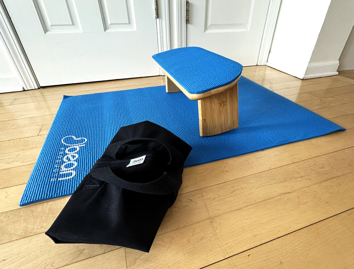Foldable meditation bench setup with mat for mindful kneeling practice