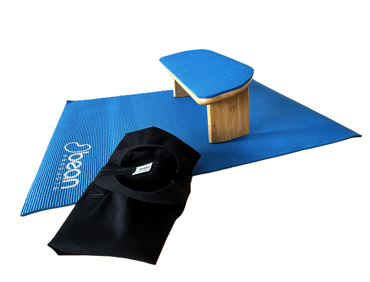 Meditation bench with yoga mat and accessories for home meditation setup