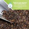 Close-up of a metal scoop filled with small brown organic buckwheat hulls against a green background with text about cooling effect.