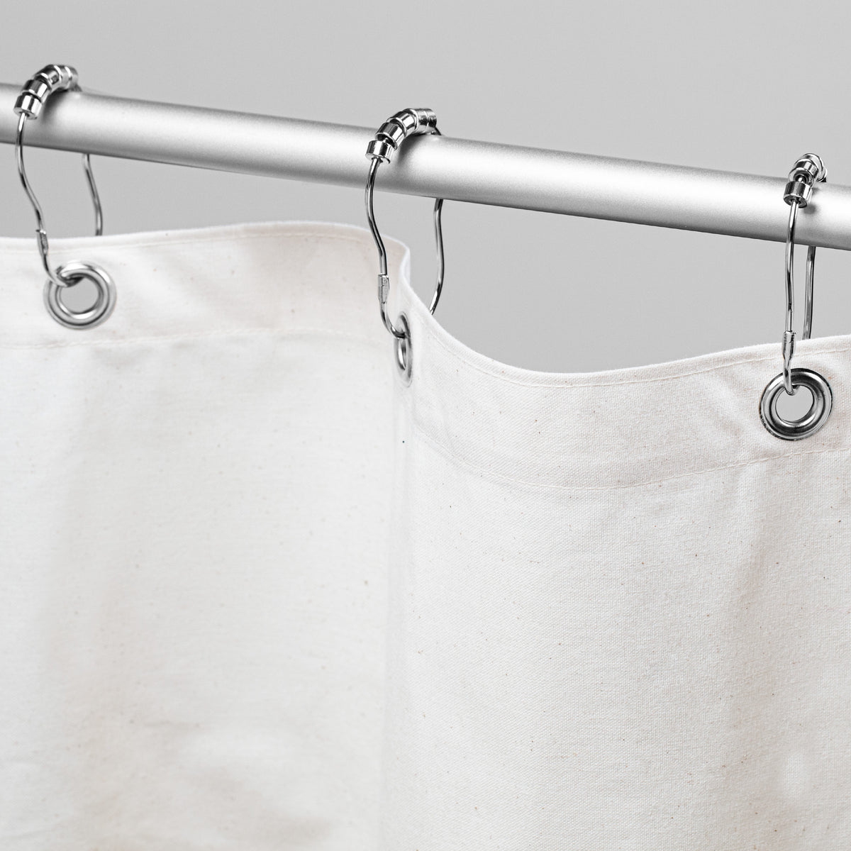 White organic cotton shower curtain with reinforced top hem