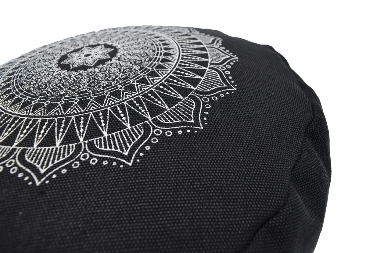 Black round meditation cushion with contrasting mandala pattern design