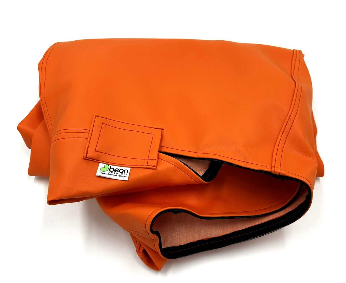 Folded orange bean bag cover showing fabric, marine grade vinyl material