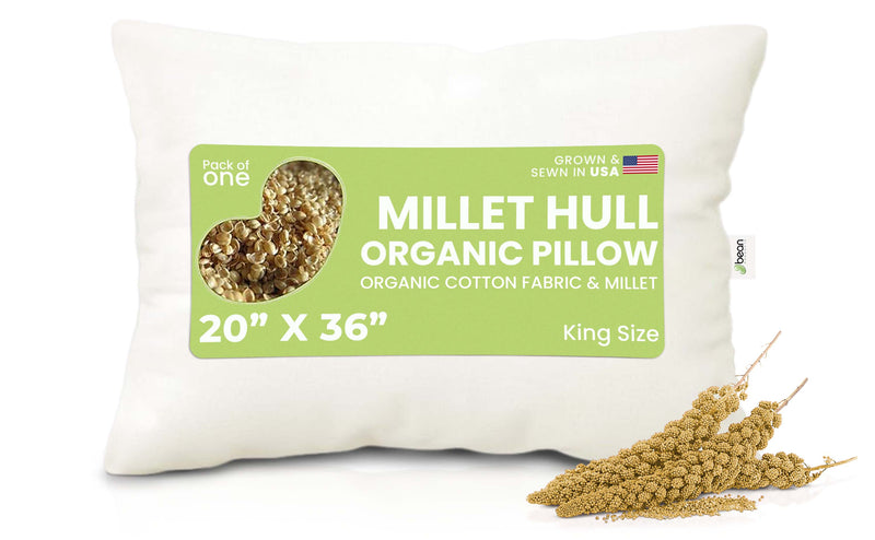 A King size organic cotton fabric pillow with millet hulls, featuring a hidden zippered opening, shown with millet grains and a wheat sheaf illustration on the label. Made in USA