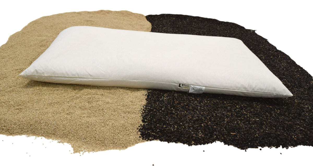 Organic multi-grain pillow displayed with natural buckwheat and millet hull filling for support and comfort
