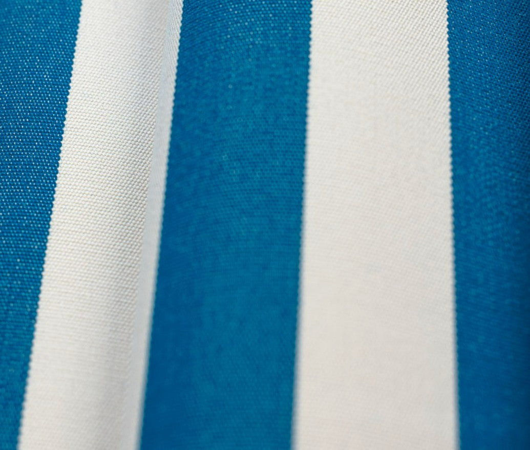 Blue and white striped fabric pattern close-up detail