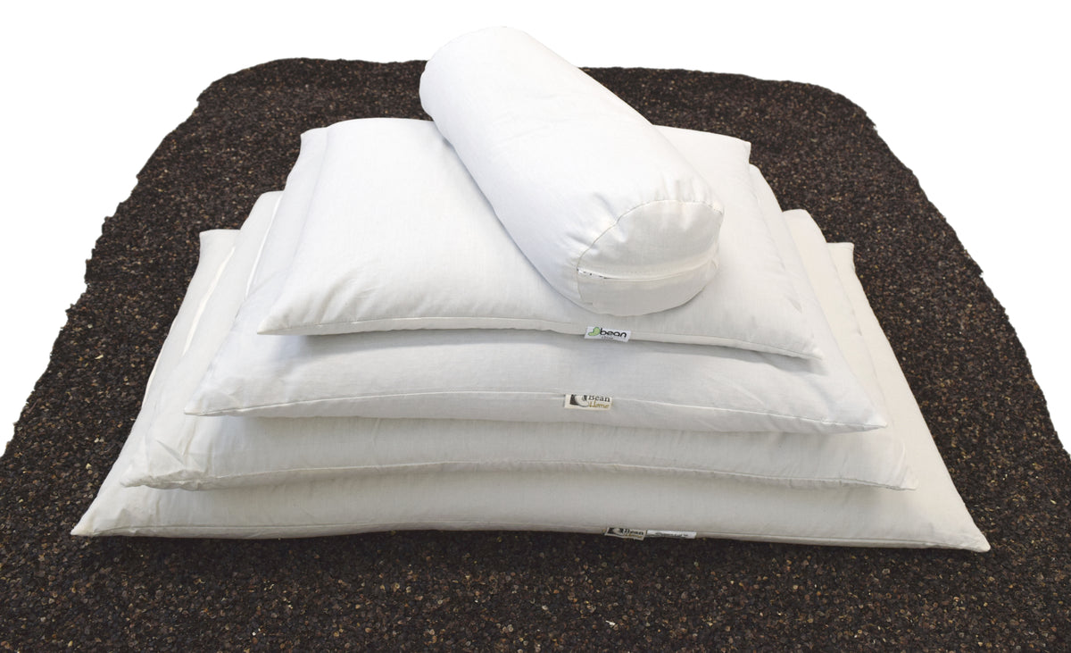 Layered buckwheat pillow showing inner hull structure and support