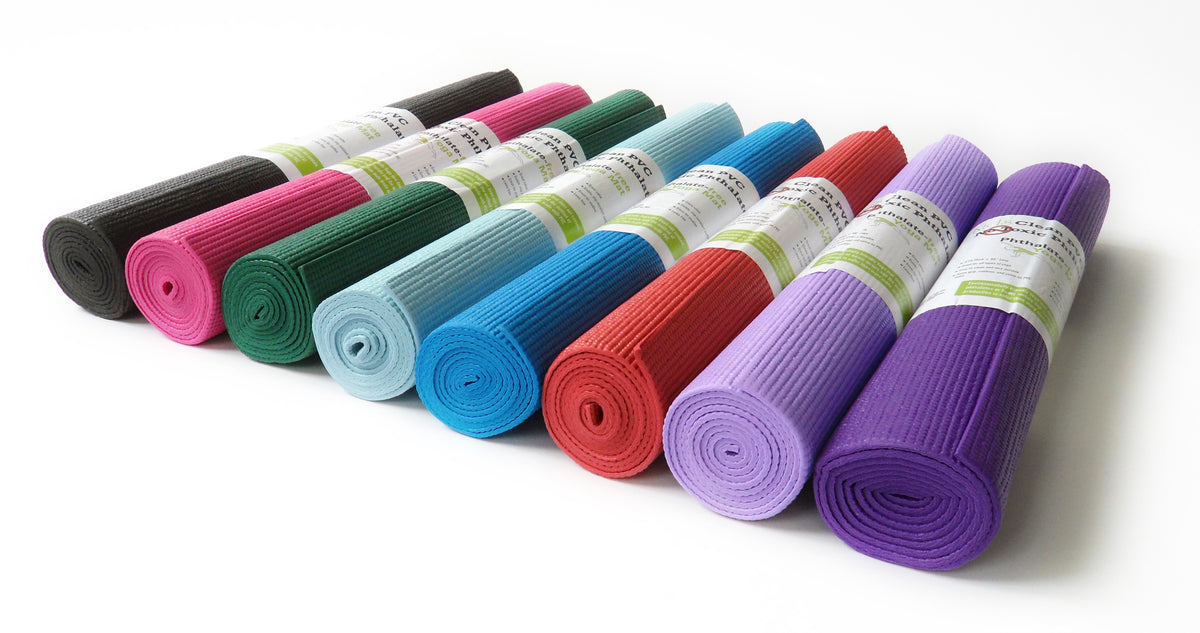 Set of colorful rolled kids yoga mats, multiple bright options for children exercise mats
