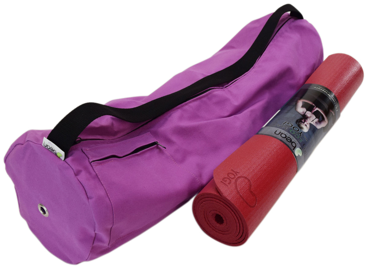 Purple cotton yoga mat bag with yoga mat partially visible