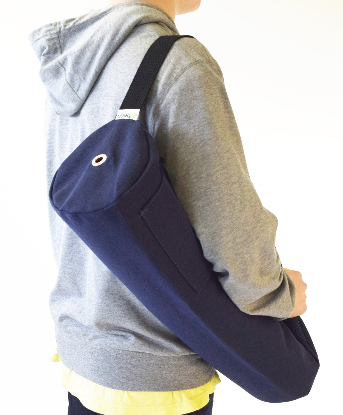 hemp yoga mat bag worn over shoulder with adjustable strap