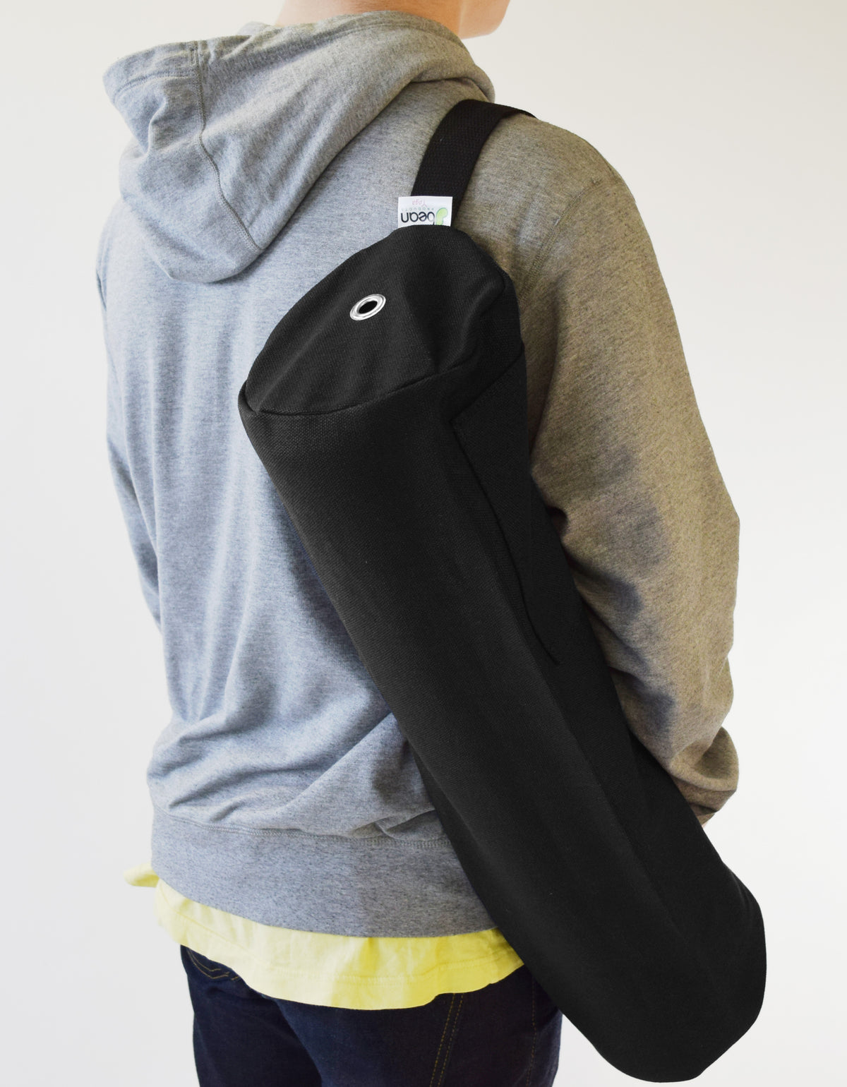 Black extra large hemp yoga mat bag worn crossbody for easy carrying