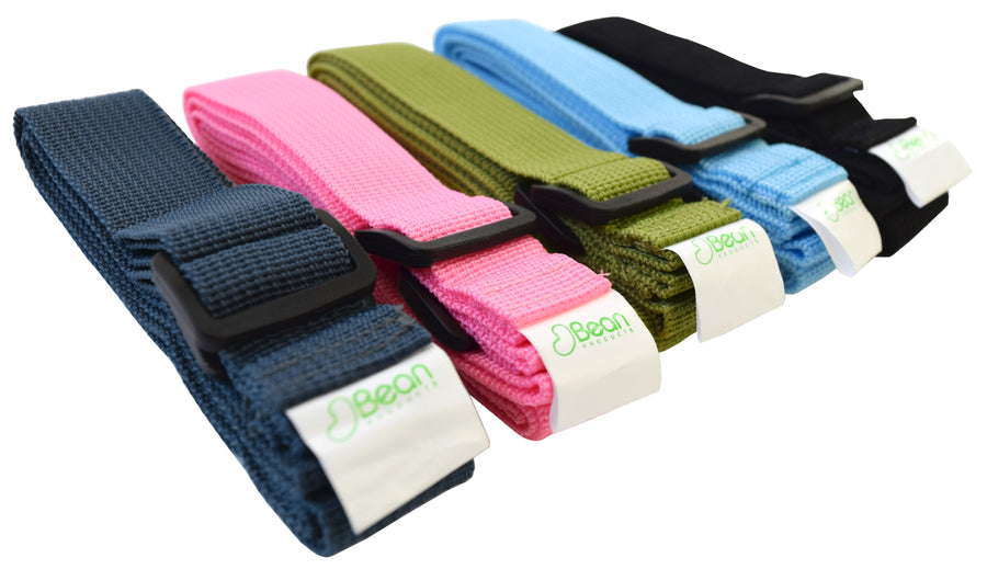 Premium cotton yoga mat sling straps in multiple colors neatly folded for storage