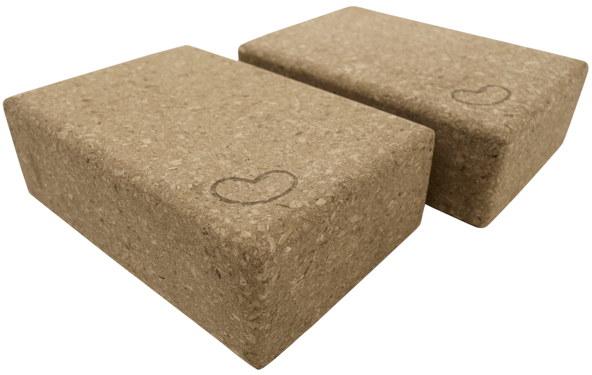 Two cork yoga blocks stacked together, natural cork texture, sturdy non-slip yoga props for balance and support