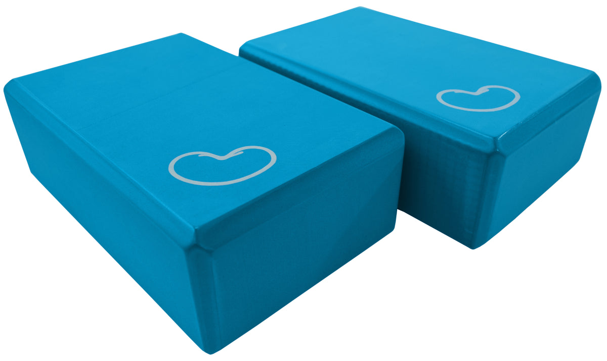 Blue yoga block set stacked showing lightweight high-density foam design for exercise support
