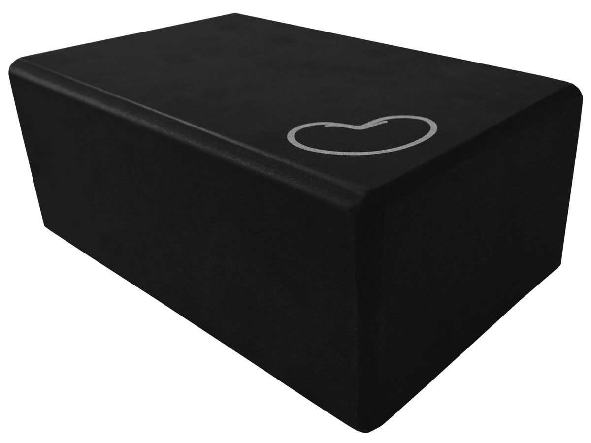 Purple yoga blocks stacked demonstrating compact design and firm support for fitness routines