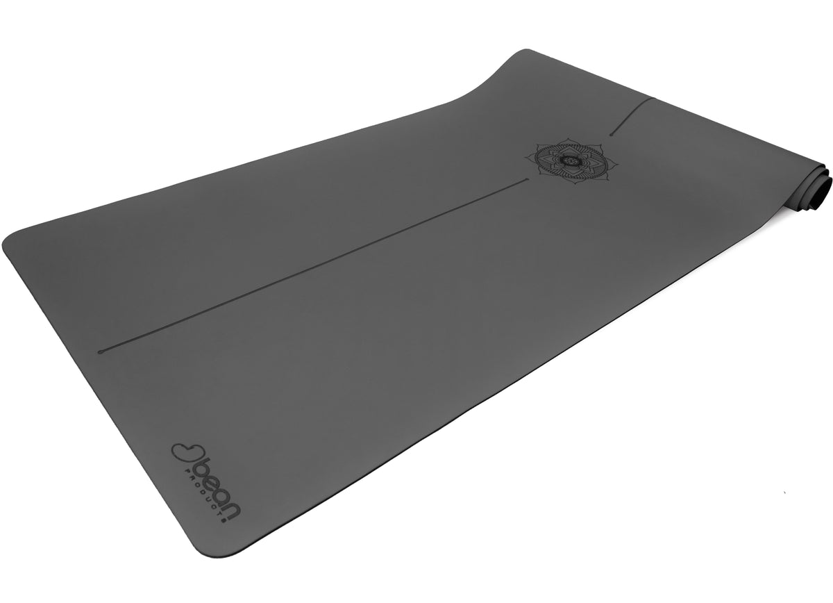 Dark gray non-slip yoga mat with durable natural rubber base top view