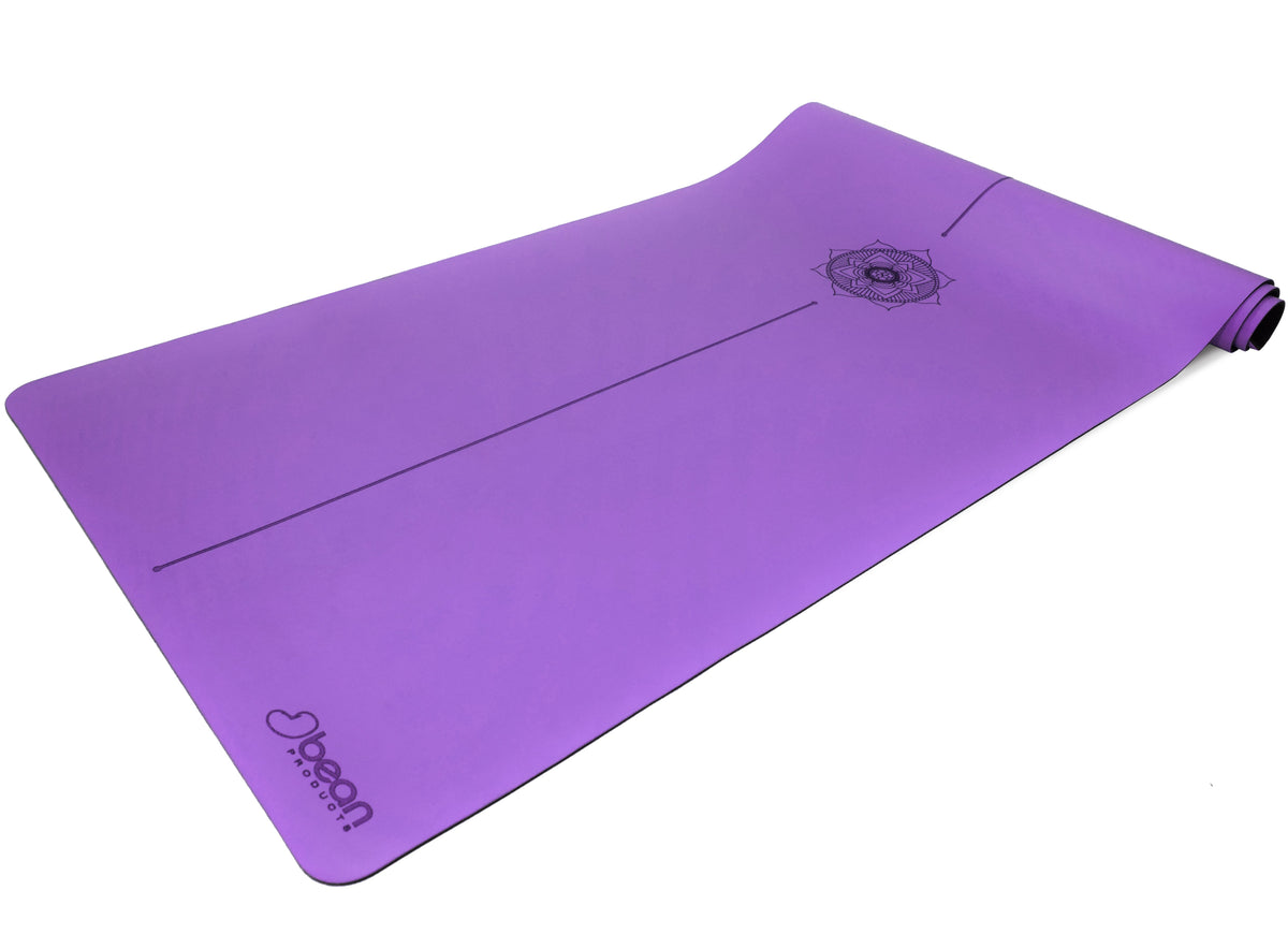 Purple non-slip yoga mat made from natural rubber with smooth PU surface top view