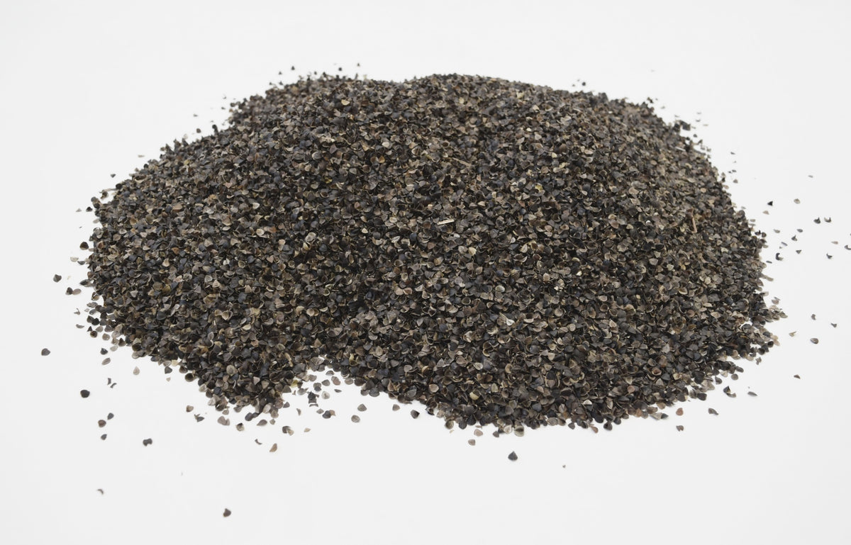 Pile of organic buckwheat hulls for craft and pillow stuffing