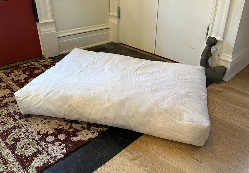 Inside cotton liner stuffed with shredded certipur foam filling dog bed