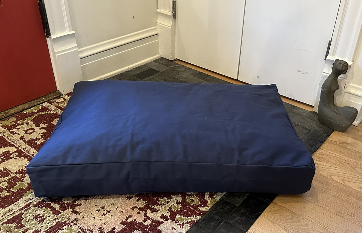 Navy blue cotton duck canvas dog bed with durable canvas fabric and foam padding