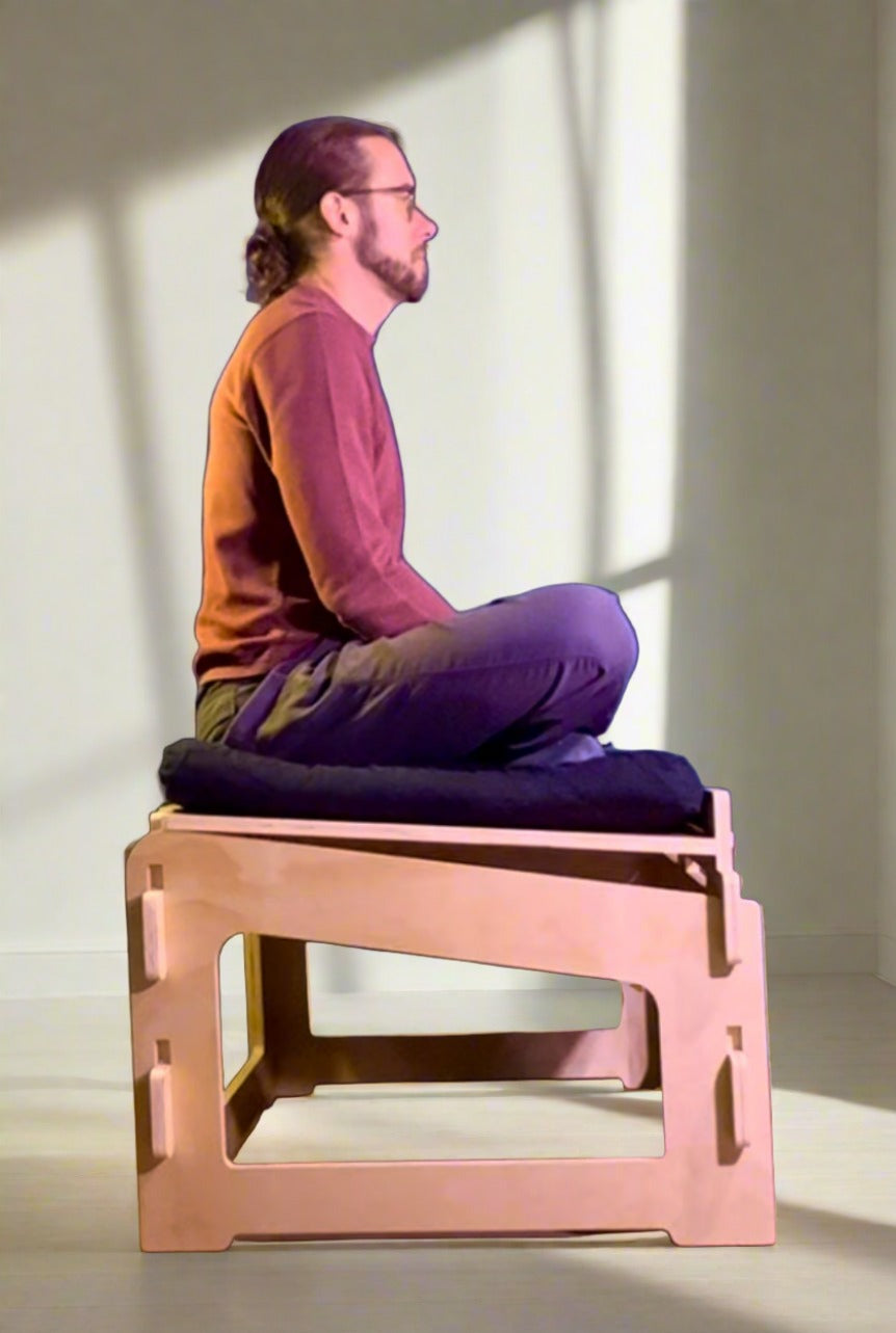 Upright seated posture demonstration using ergonomic meditation chair