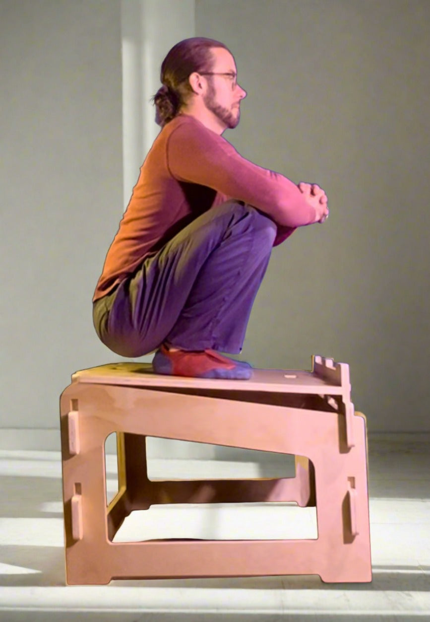 Cross-legged sitting position on active sitting meditation stool