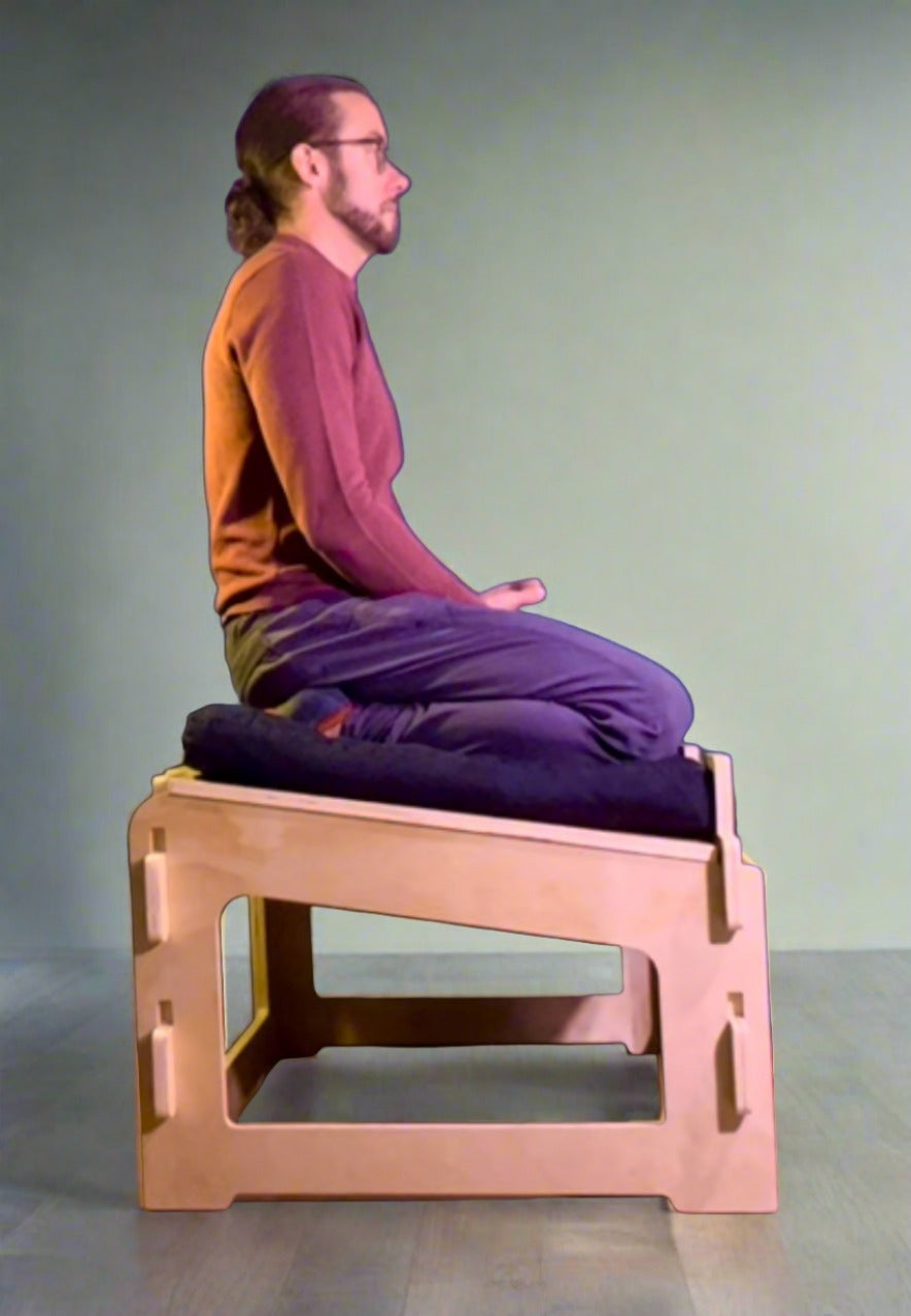 Kneeling meditation posture supported by adjustable active sitting chair