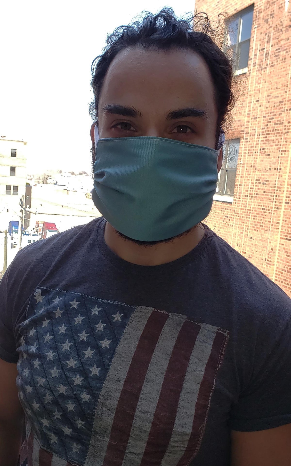 Handsome man wearing protective face mask