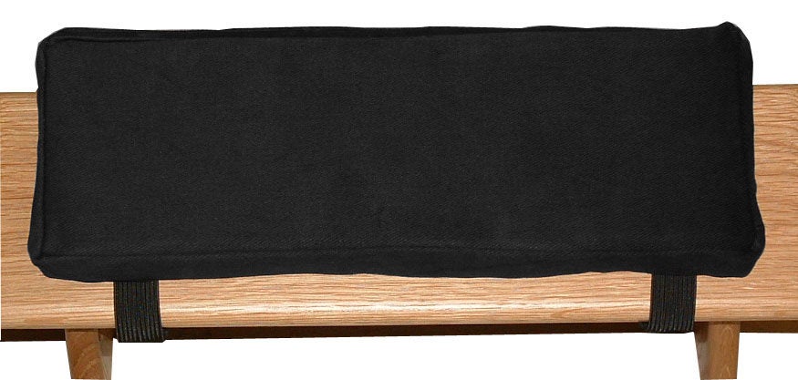 Meditation bench with cushion placed on top for comfortable kneeling