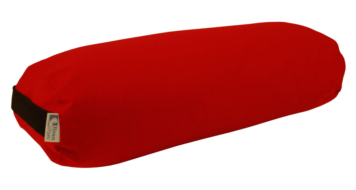 Red pranayama round yoga bolster in organic cotton, compact cylindrical cushion for pranayama breathing and yoga support